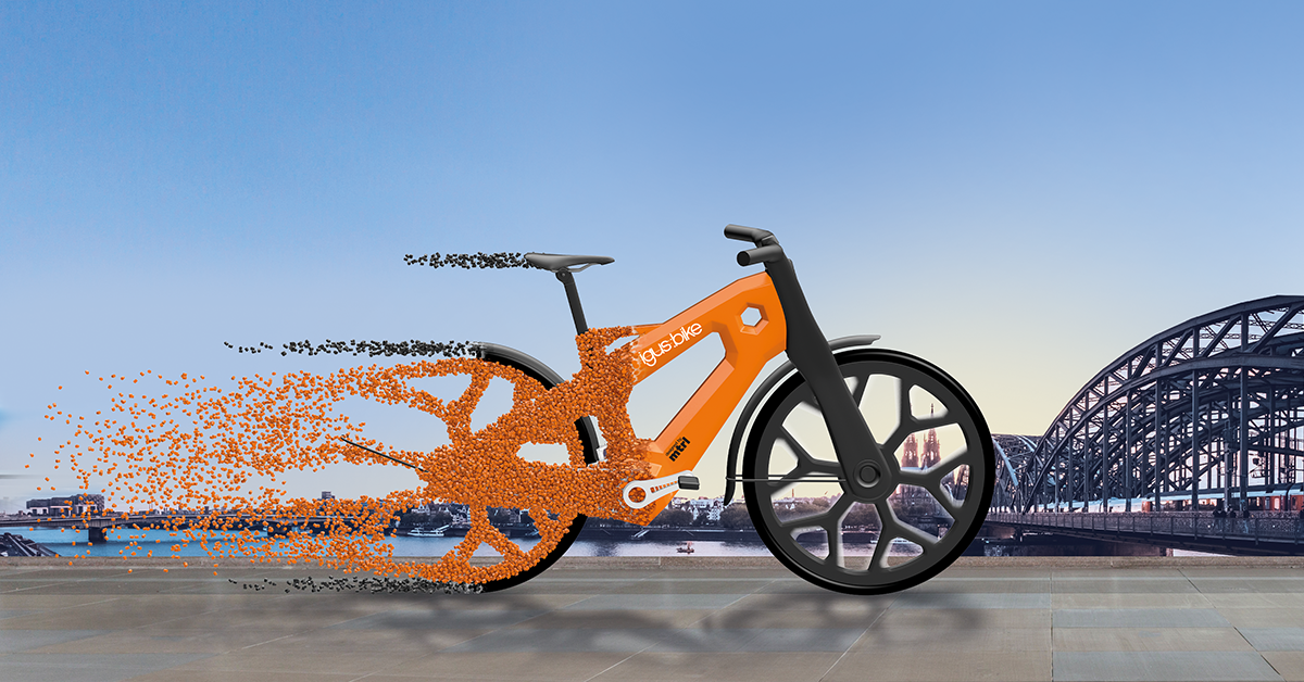 Illustration von einem Fahrrad, welches sich in kleine Partikel auflöst